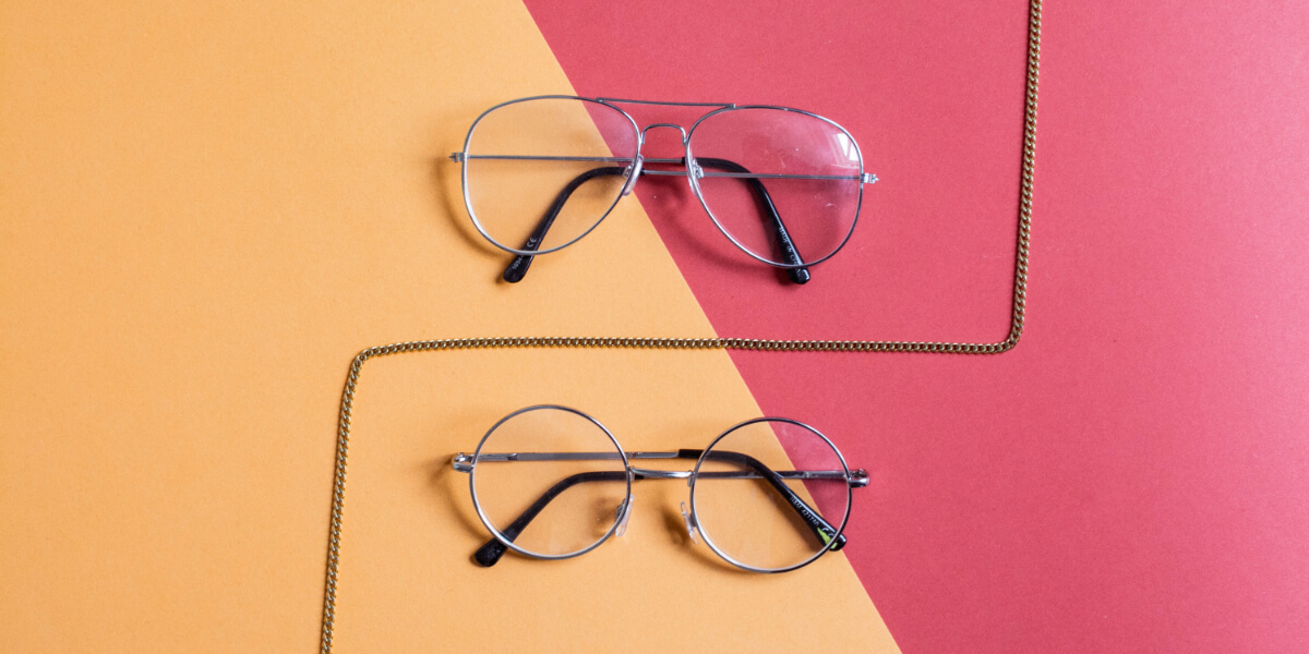 Two sliver frames with an Orange and pink background